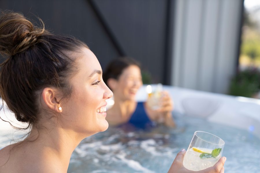 Family enjoying a Caldera Utopia Ravello hot tub