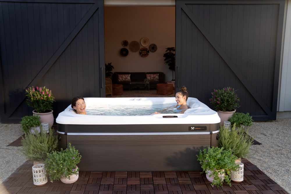 Family enjoying a Caldera hot tub together