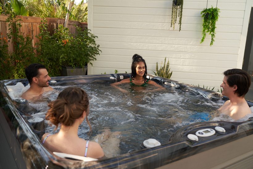 Caldera Vacanza Series hot tub couple